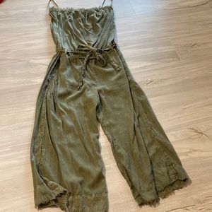 Beautiful olive colored romper size Large. Worn only twice